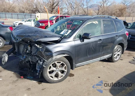 2018 Subaru Forester 2.5I Touring z USA, uszkodzony, nr VIN JF2SJAWC4JH452132
